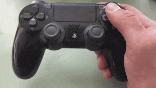 Animated GIF of thumb moving between the Square and Triangle buttons